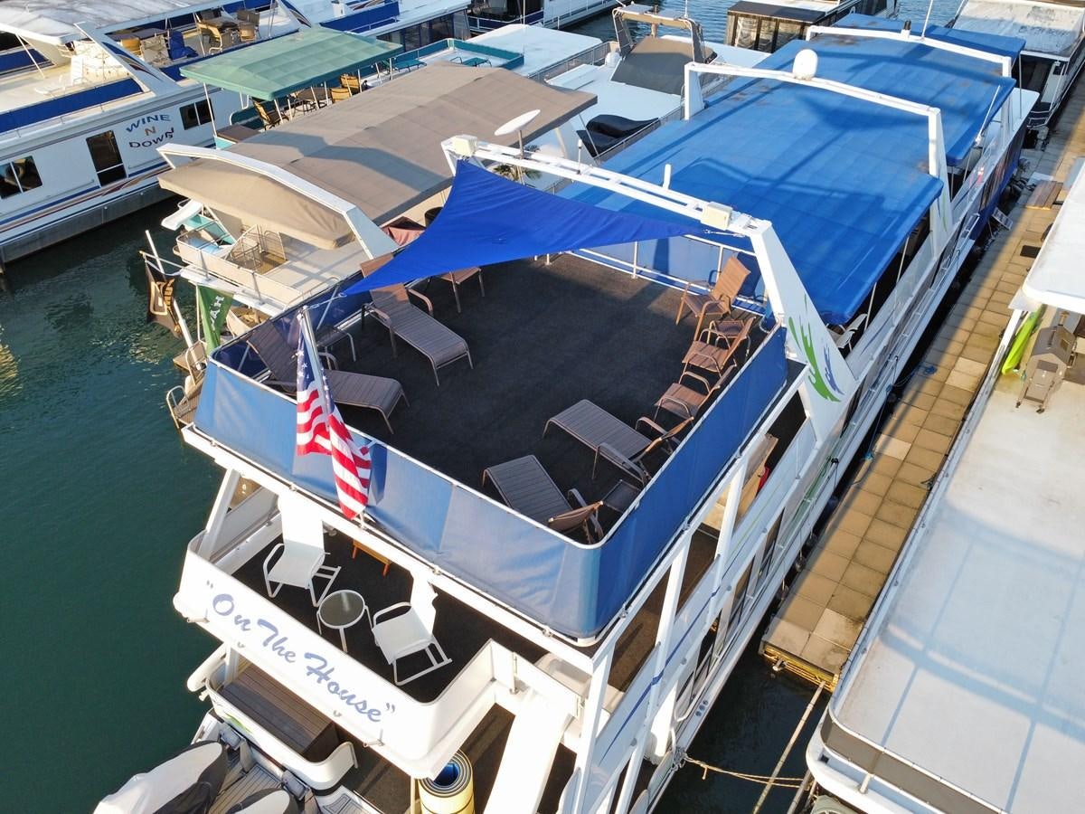 a boat docked at a pier aboard 2010/1995 STARDUST 20 X 95WB NLST Yacht for Sale
