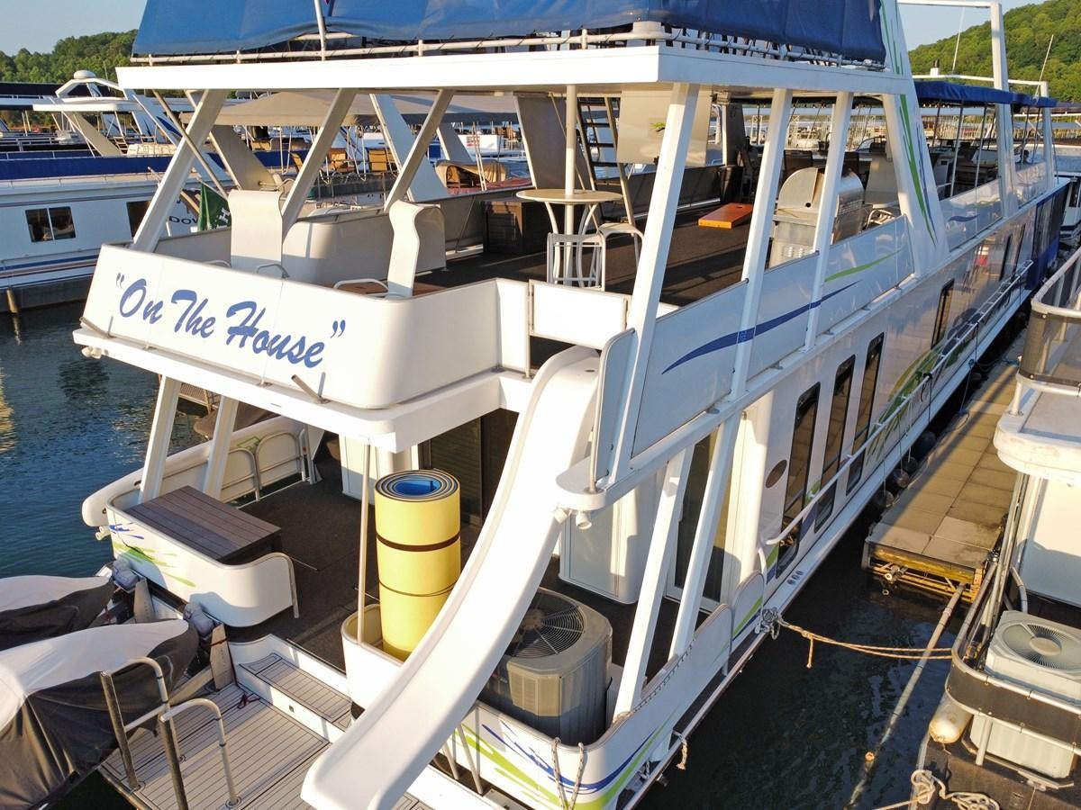 a boat docked at a pier aboard 2010/1995 STARDUST 20 X 95WB NLST Yacht for Sale