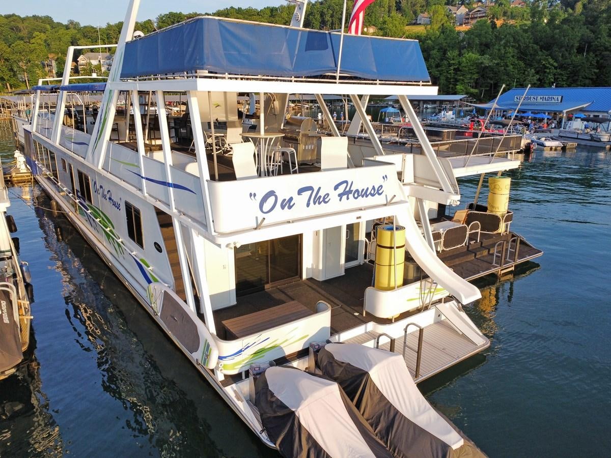 a boat docked at a pier aboard 2010/1995 STARDUST 20 X 95WB NLST Yacht for Sale
