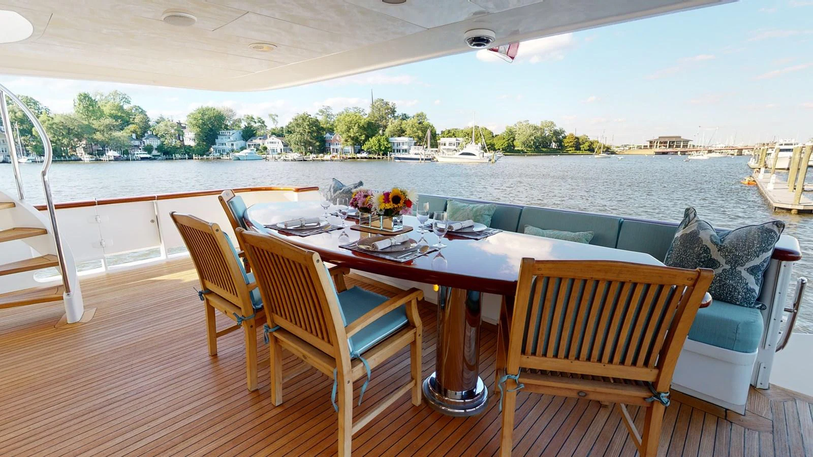 a table with chairs around it aboard SUMMER LOVE Yacht for Sale