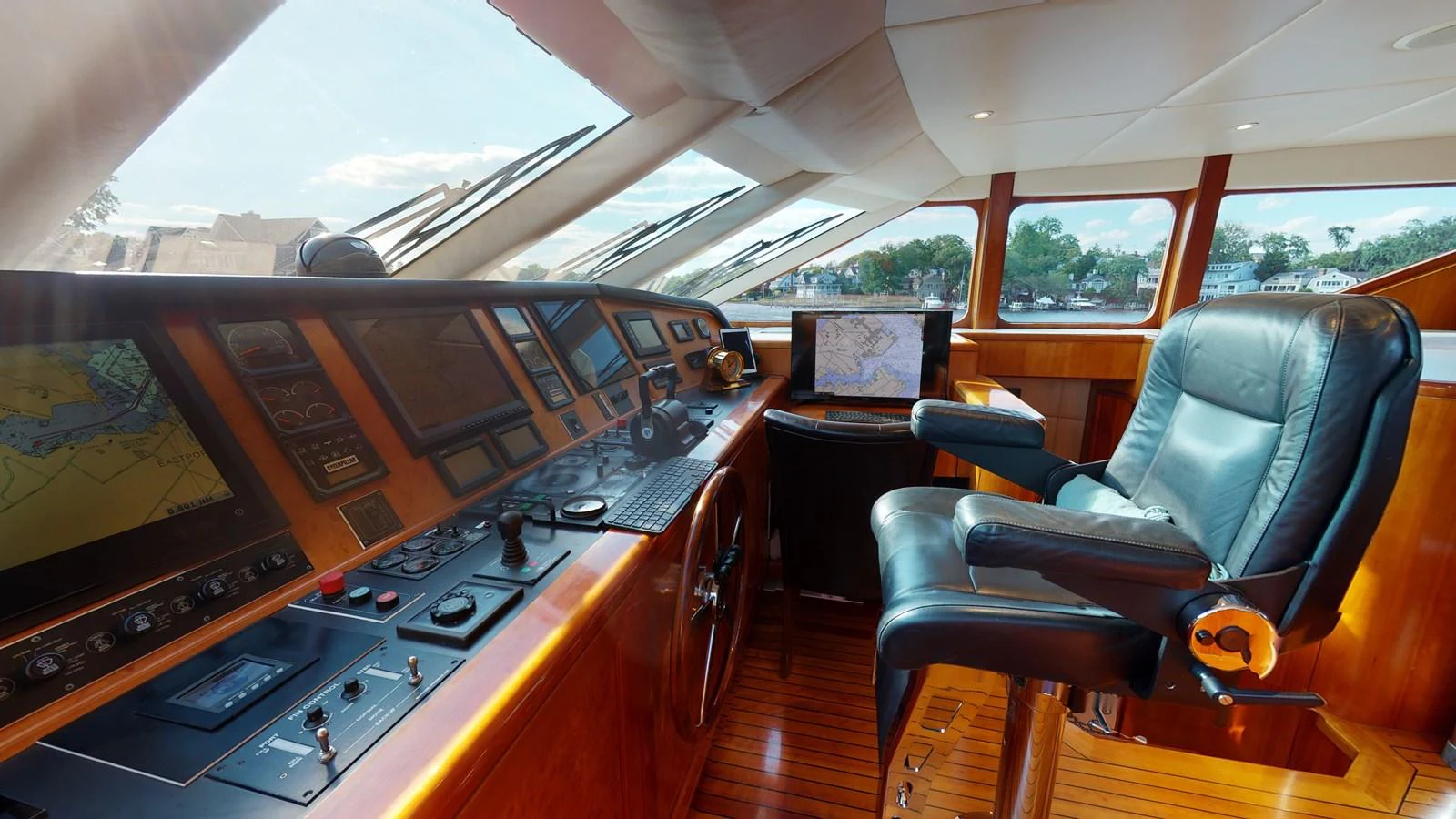 a room with a piano and a chair aboard SUMMER LOVE Yacht for Sale