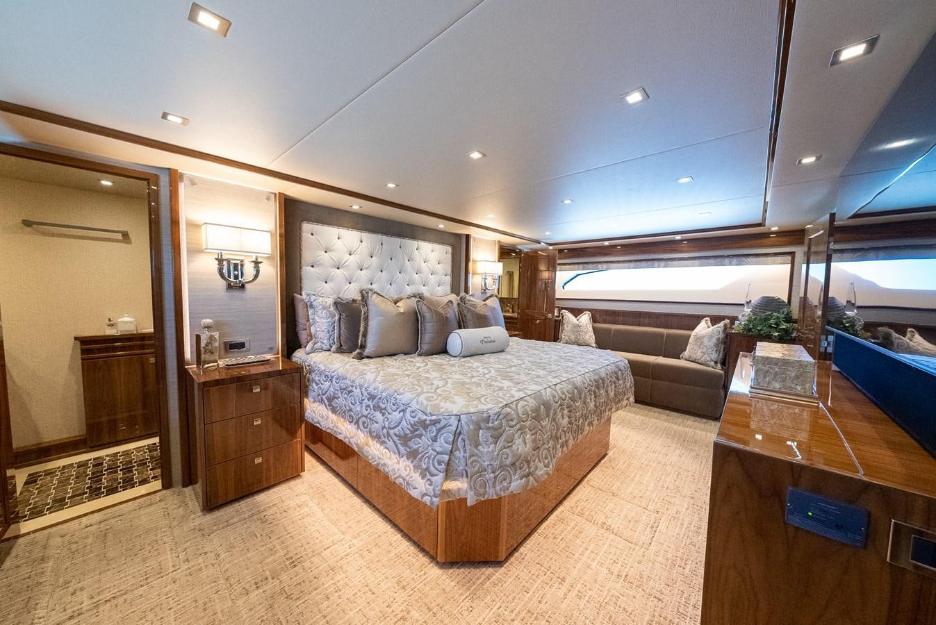 a large bedroom with a large bed aboard ANOTHER DAY IN PARADISE Yacht for Sale