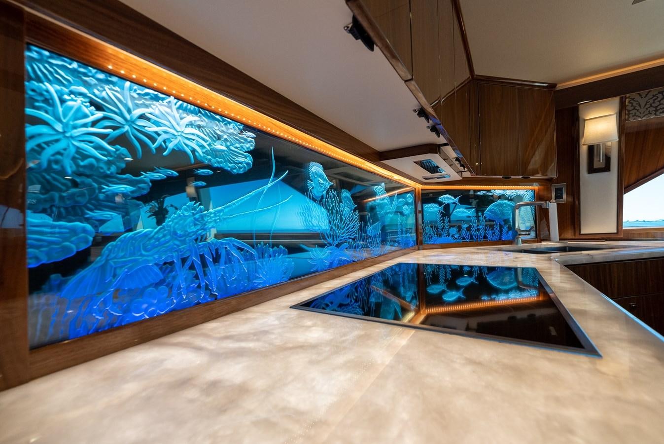 a large aquarium in a room aboard ANOTHER DAY IN PARADISE Yacht for Sale
