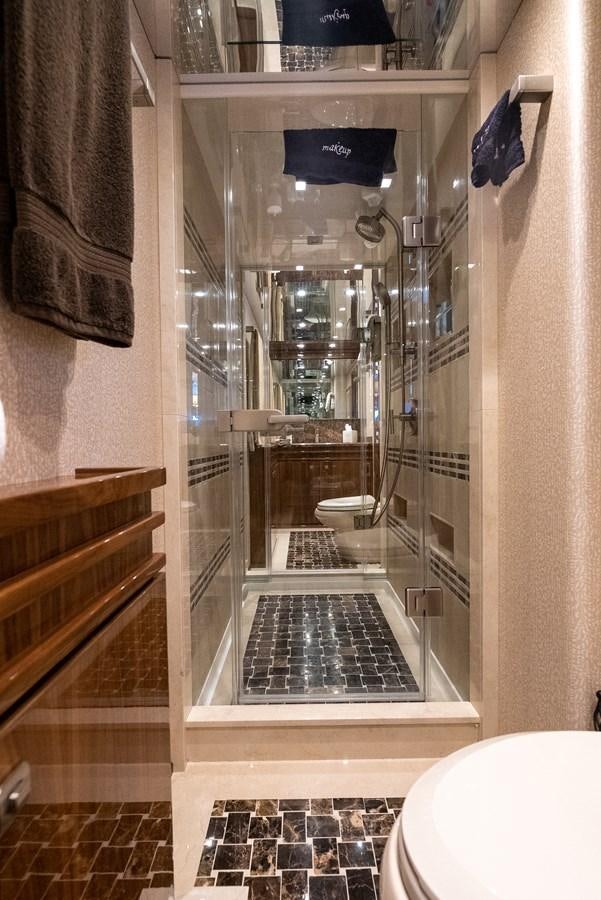 a shower unit with a glass door aboard ANOTHER DAY IN PARADISE Yacht for Sale