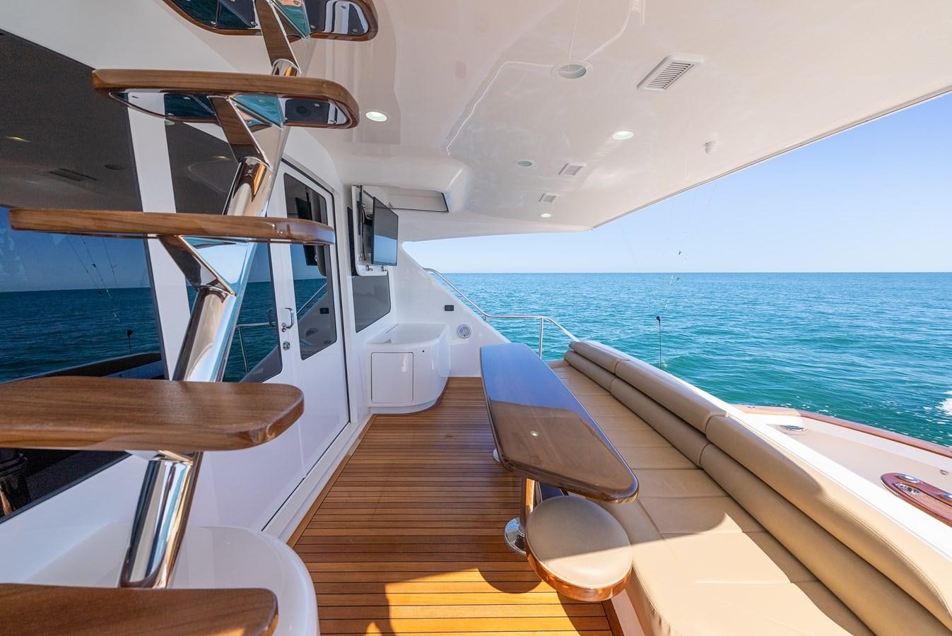 a boat on the water aboard ANOTHER DAY IN PARADISE Yacht for Sale
