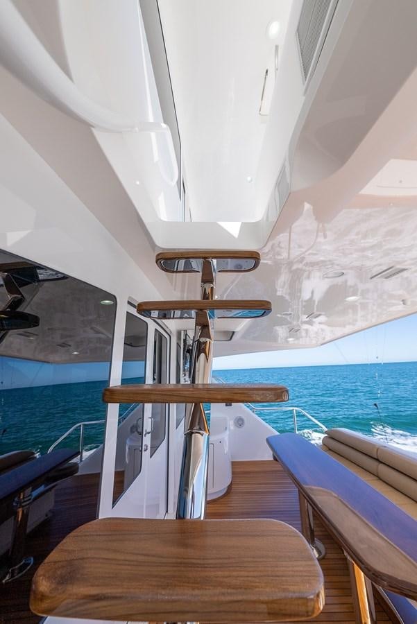 a boat on a body of water aboard ANOTHER DAY IN PARADISE Yacht for Sale