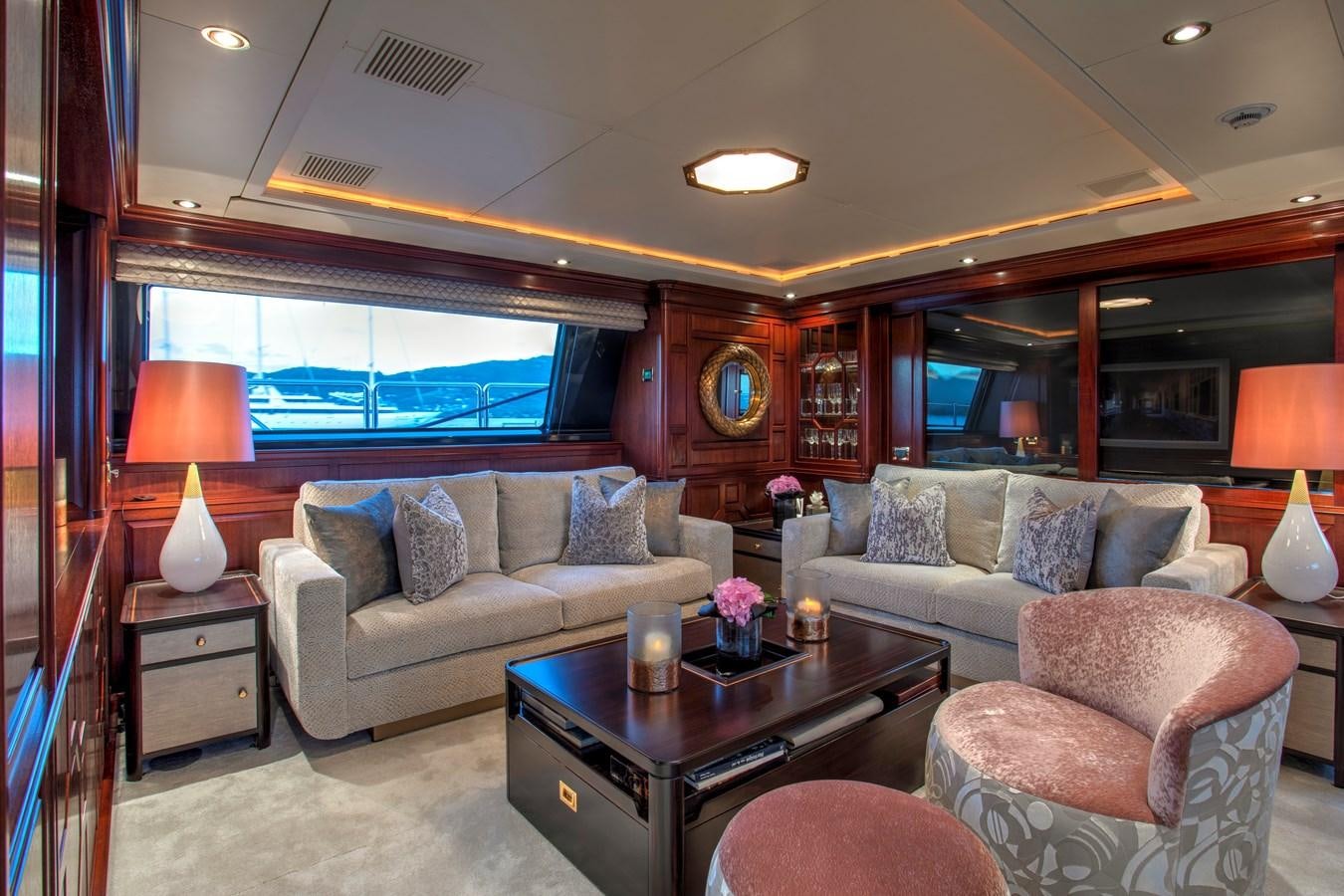 a living room with a couch and a coffee table aboard MARE NOSTRUM Yacht for Charter