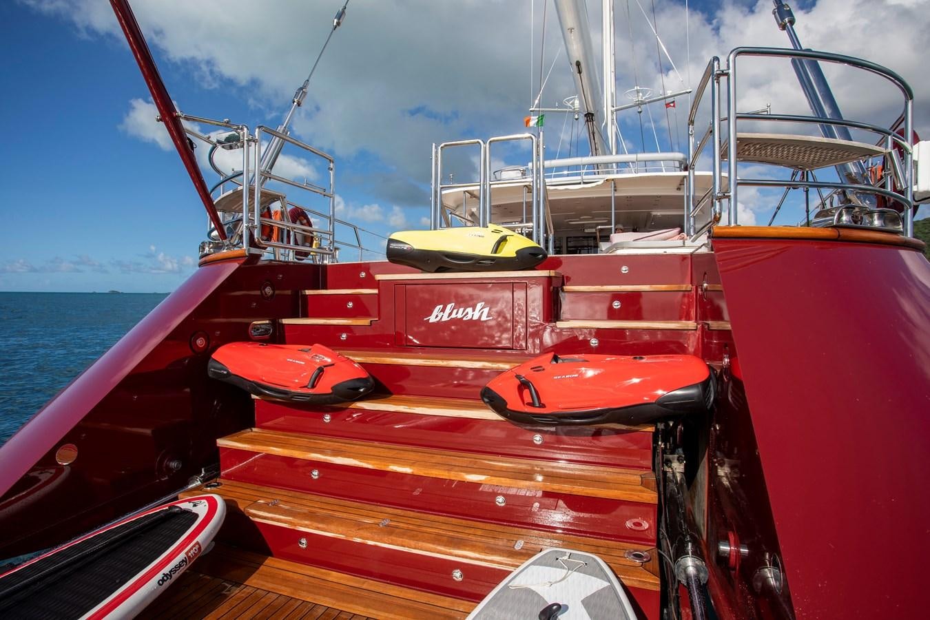 a red boat on a boat aboard MARE NOSTRUM Yacht for Charter