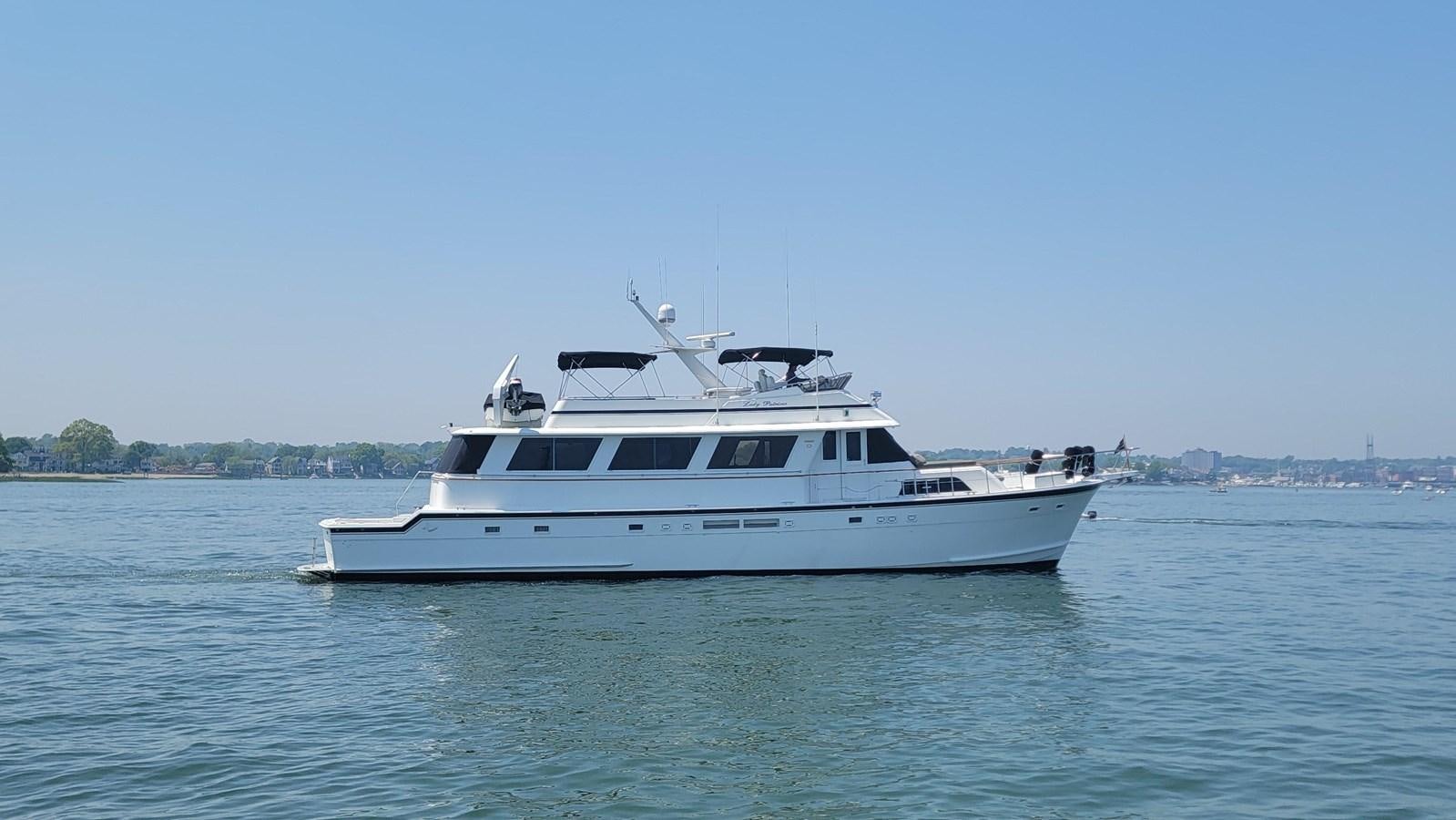 a white boat in the water aboard LADY PATRICIA Yacht for Sale