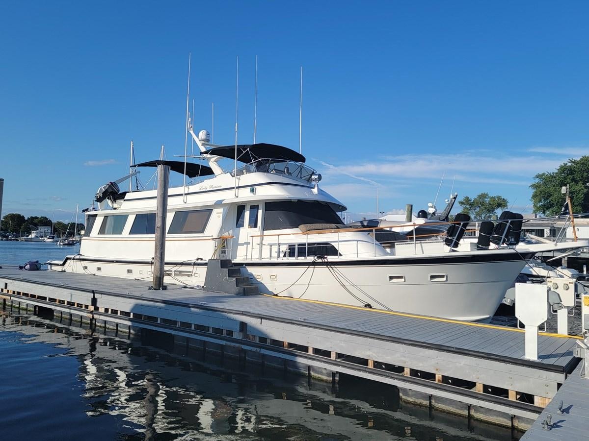 a boat docked at a pier aboard LADY PATRICIA Yacht for Sale