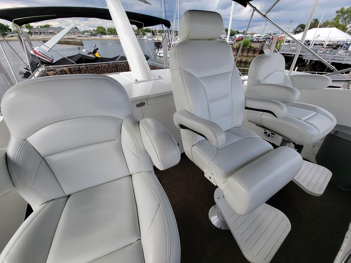 a group of chairs in a boat aboard LADY PATRICIA Yacht for Sale