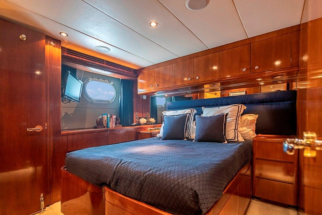 a bed in a cabin aboard PURA VIDA Yacht for Sale