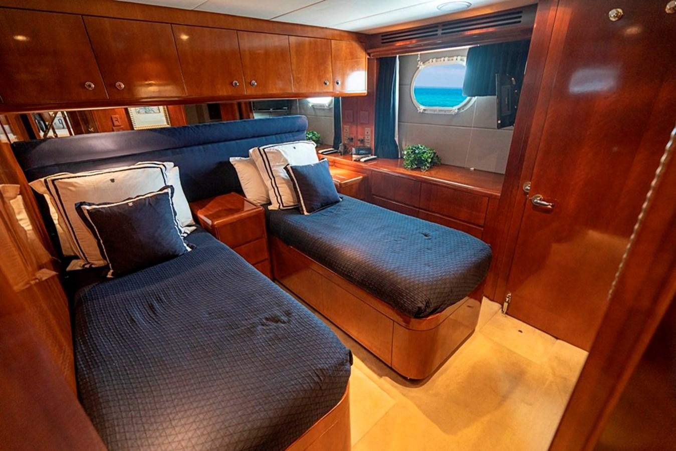 a train with couches aboard PURA VIDA Yacht for Sale