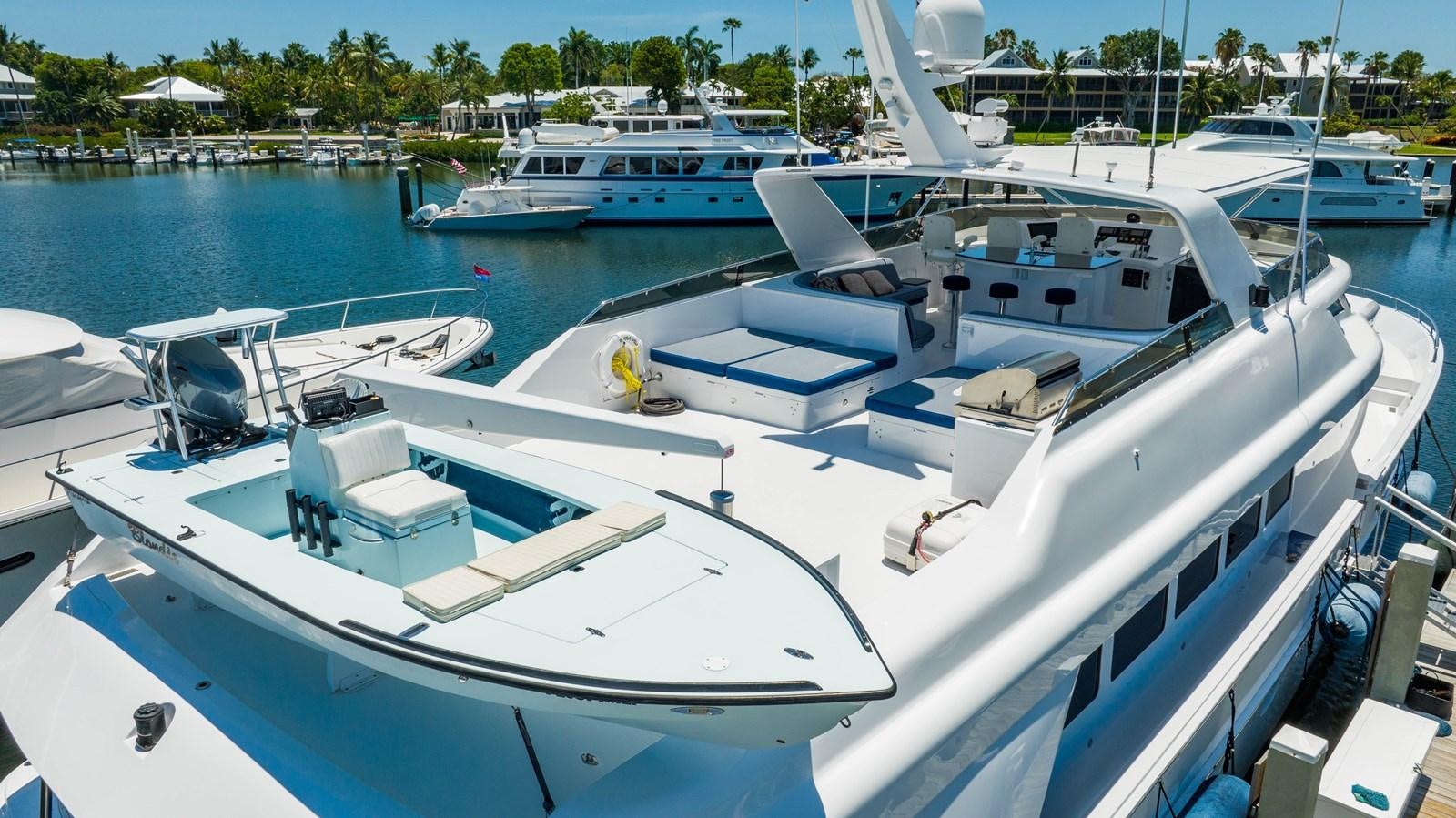 a group of boats in a harbor aboard PURA VIDA Yacht for Sale