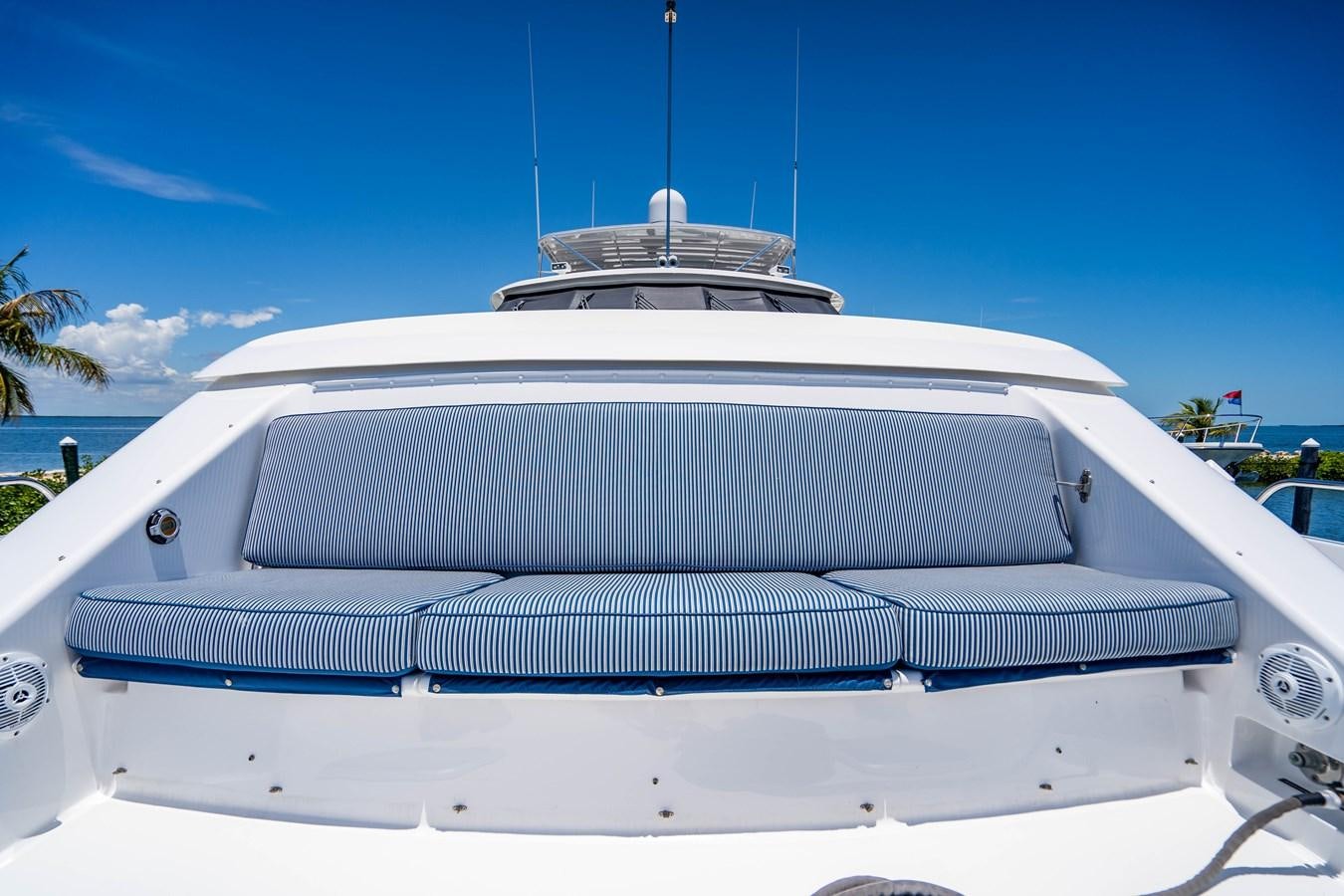 a white car with a white roof aboard PURA VIDA Yacht for Sale