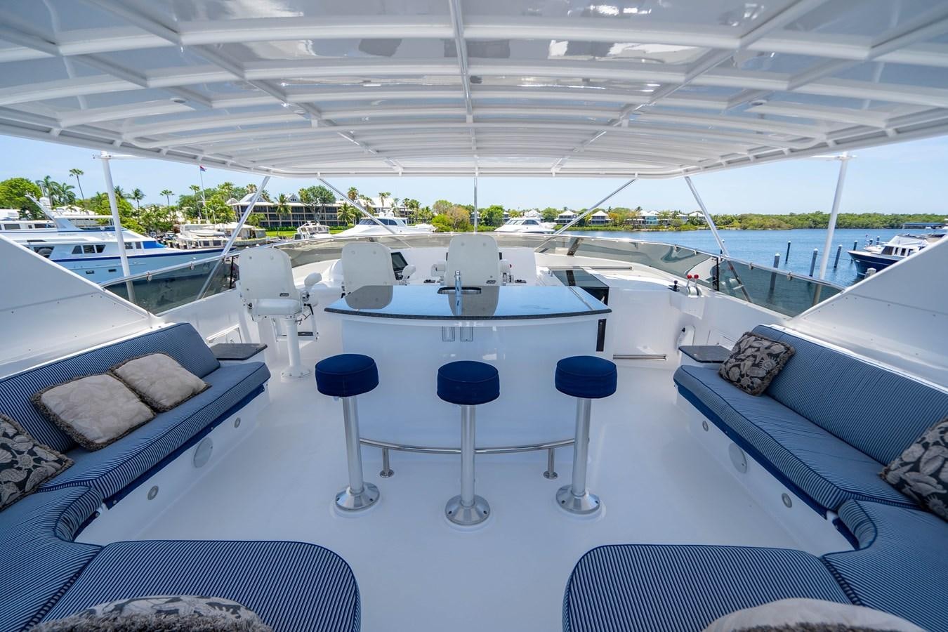 a white table on a boat aboard PURA VIDA Yacht for Sale