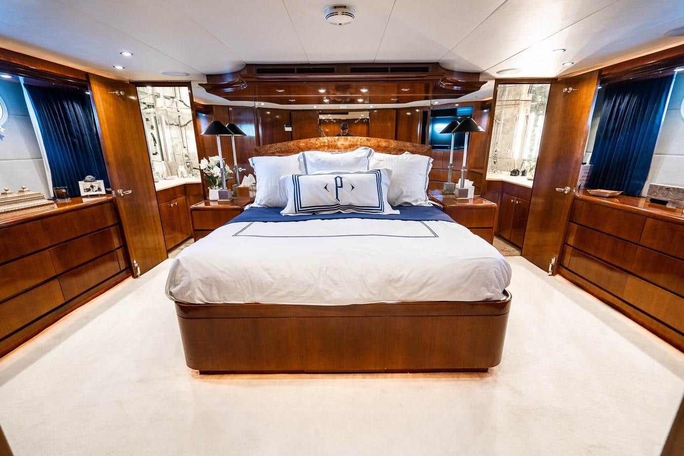 a bed in a room aboard PURA VIDA Yacht for Sale