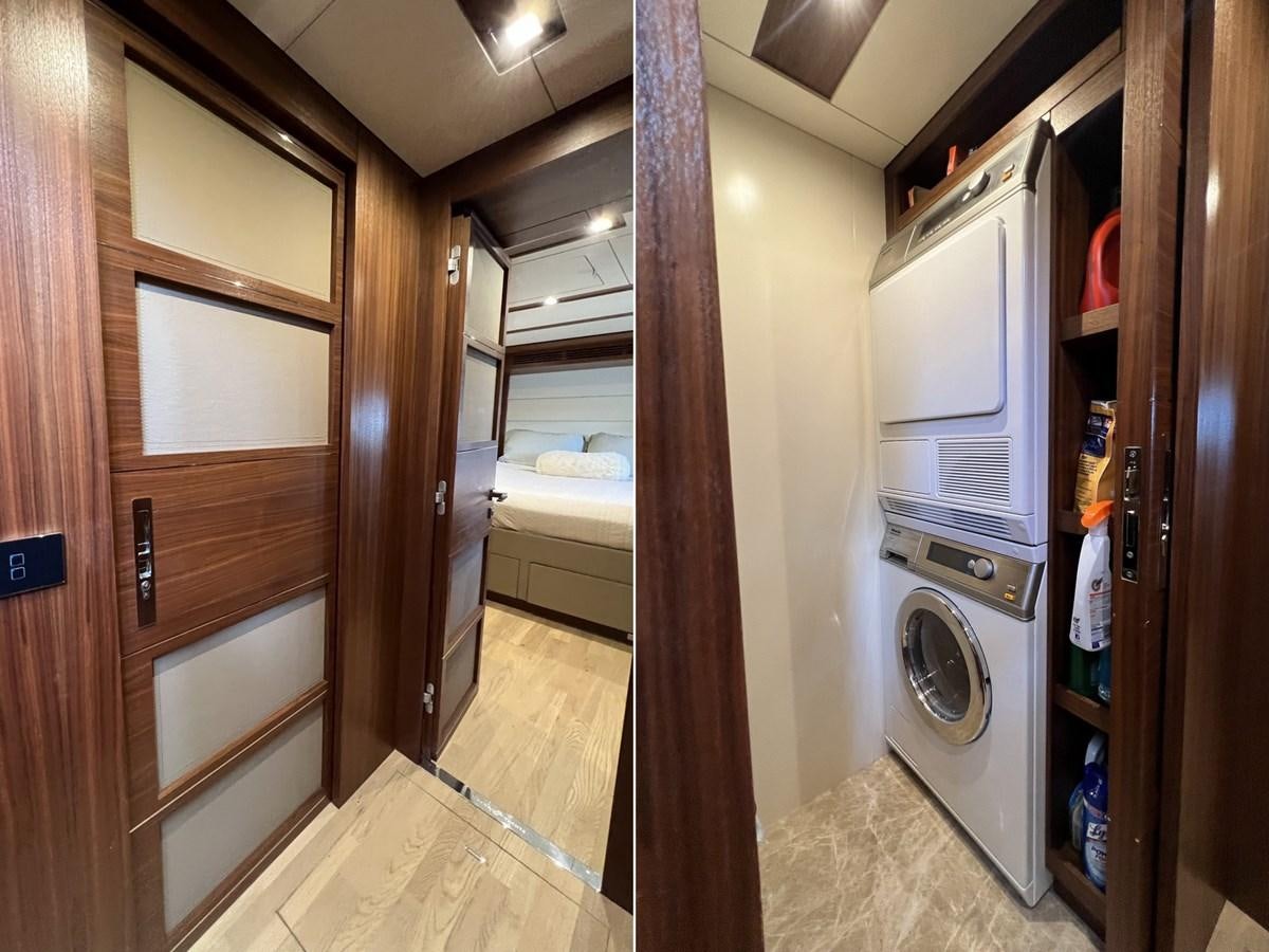 a room with a washing machine and dryer aboard SIRENA 64 FLYBRIDGE Yacht for Sale