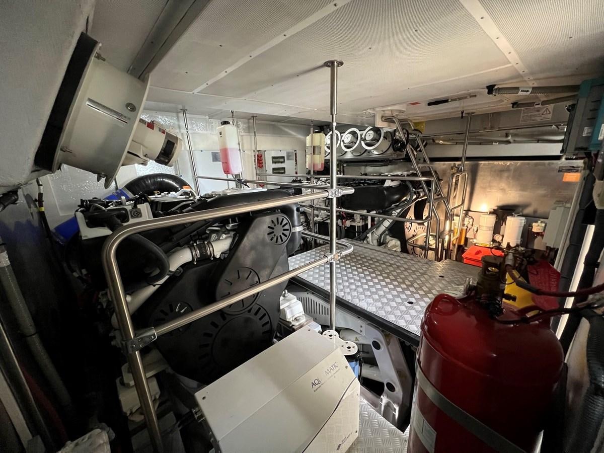 a large machine in a factory aboard SIRENA 64 FLYBRIDGE Yacht for Sale