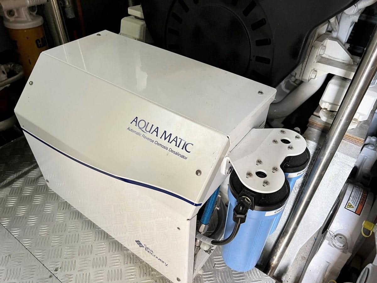 a machine with a face aboard SIRENA 64 FLYBRIDGE Yacht for Sale