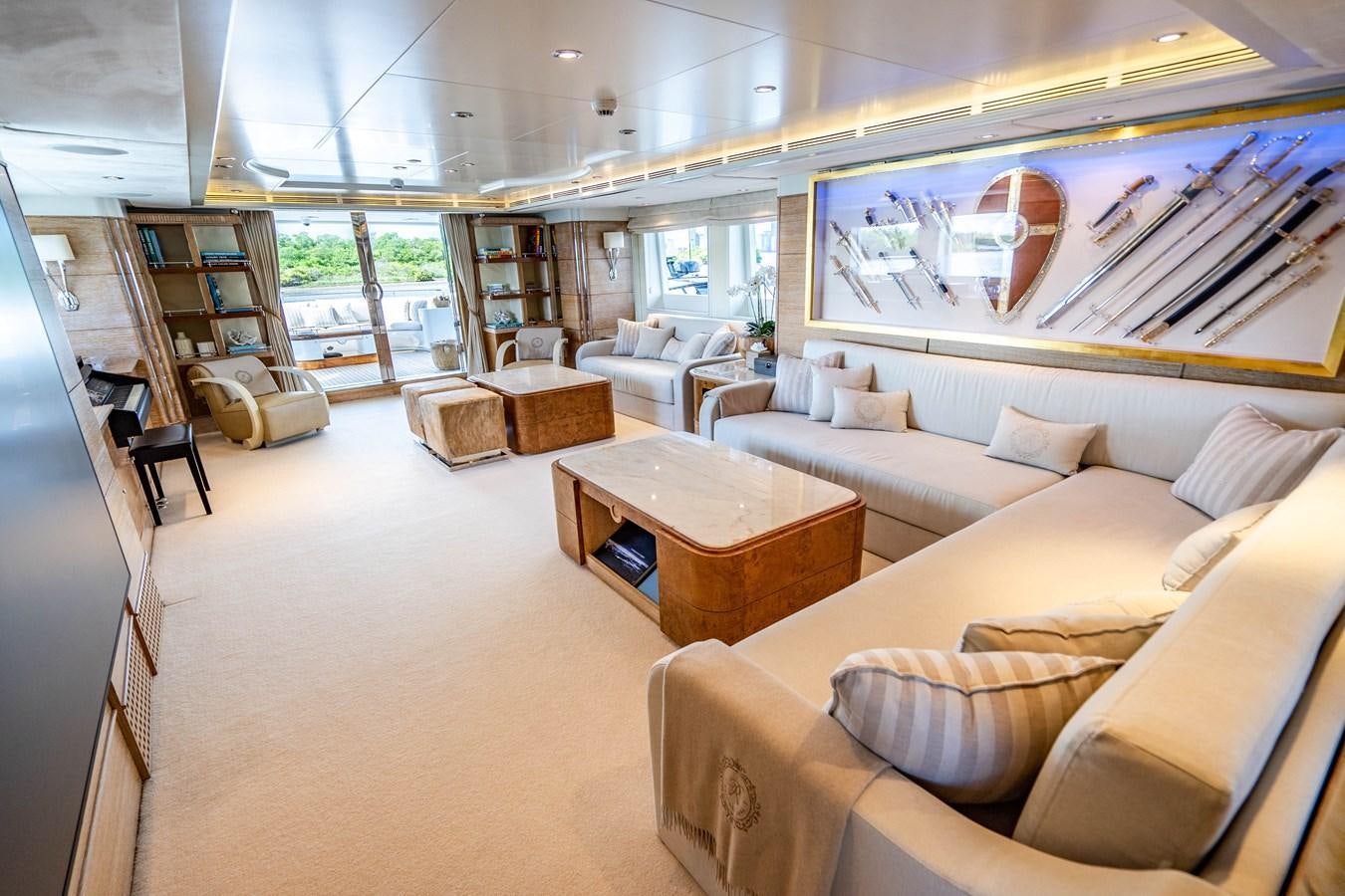 a living room with a large window aboard ARTEMISEA Yacht for Charter