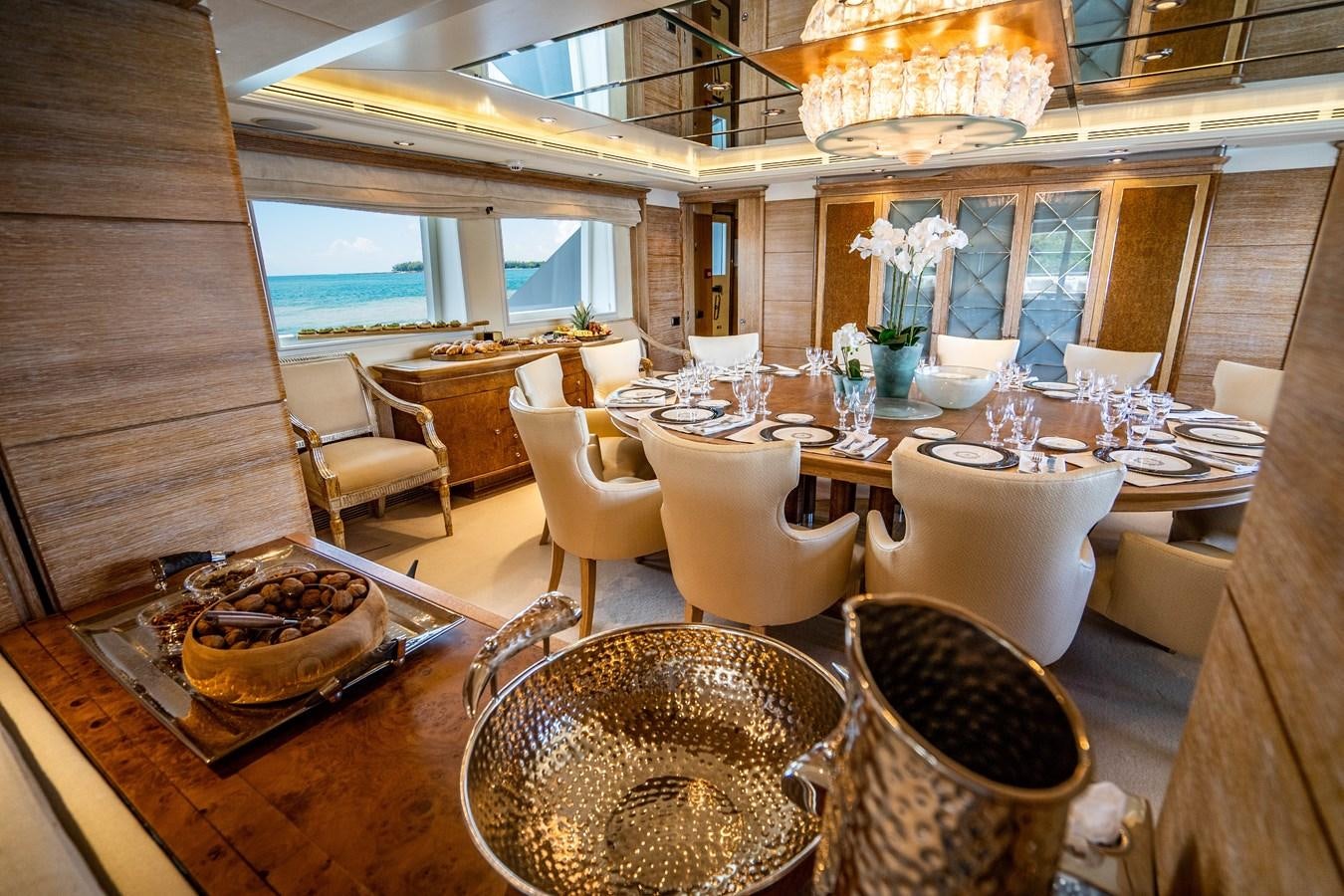 a dining room with a table and chairs aboard ARTEMISEA Yacht for Charter