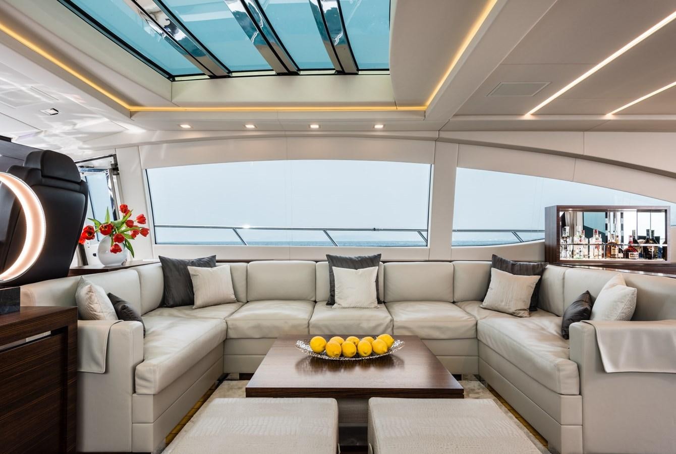 a living room with a couch and a table aboard MINE SET Yacht for Sale
