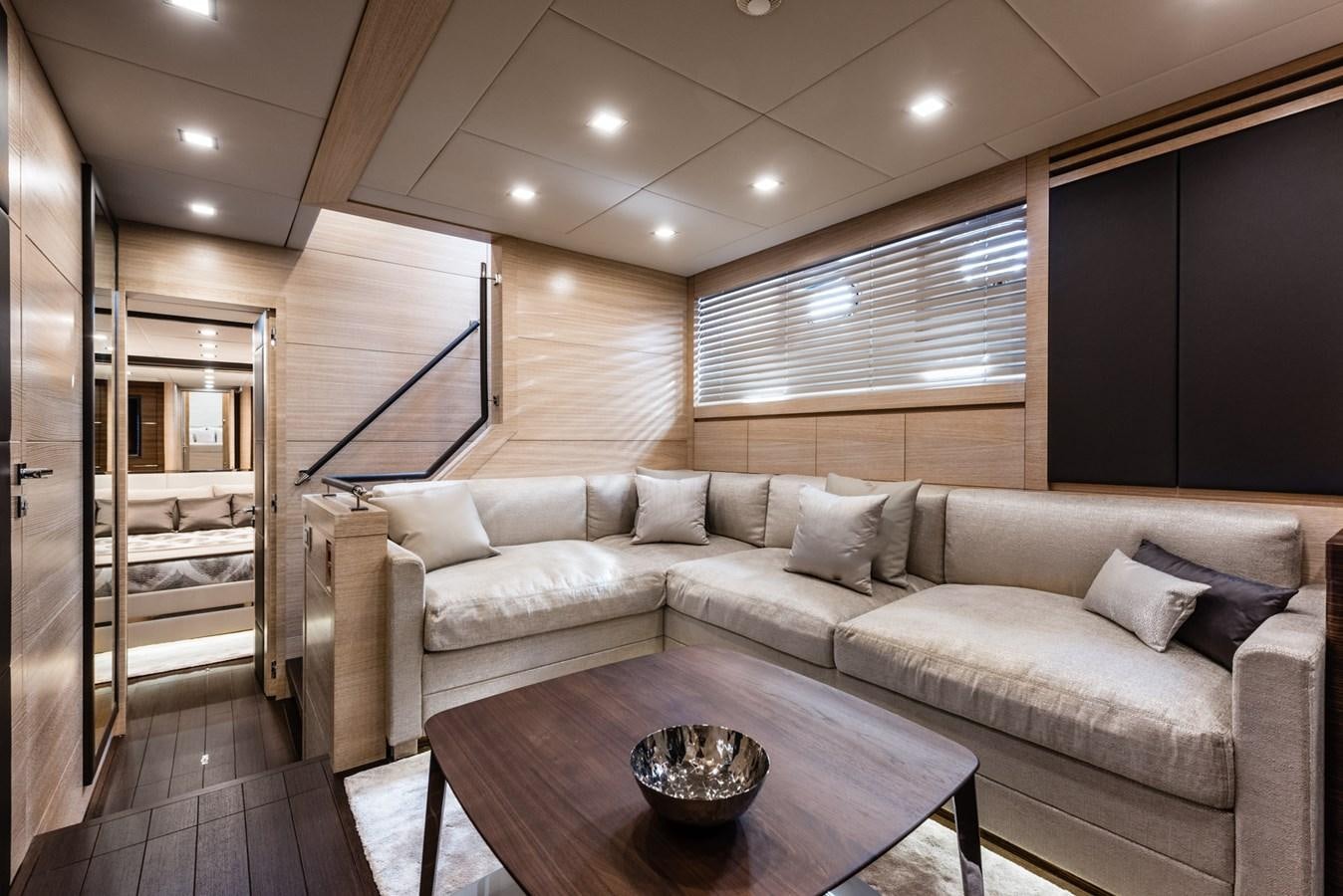 a living room with a couch and a coffee table aboard MINE SET Yacht for Sale