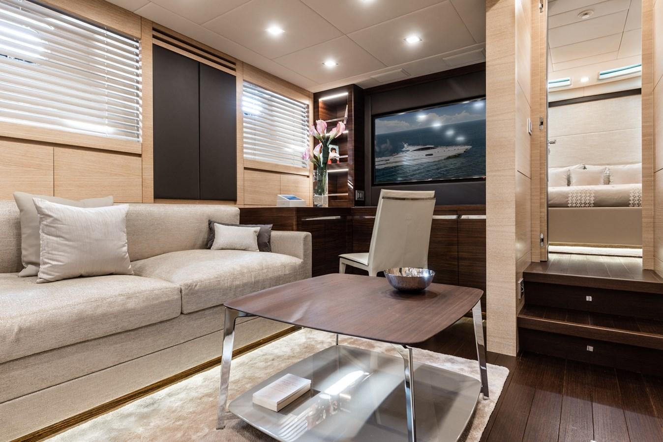 a living room with a couch and a coffee table aboard MINE SET Yacht for Sale
