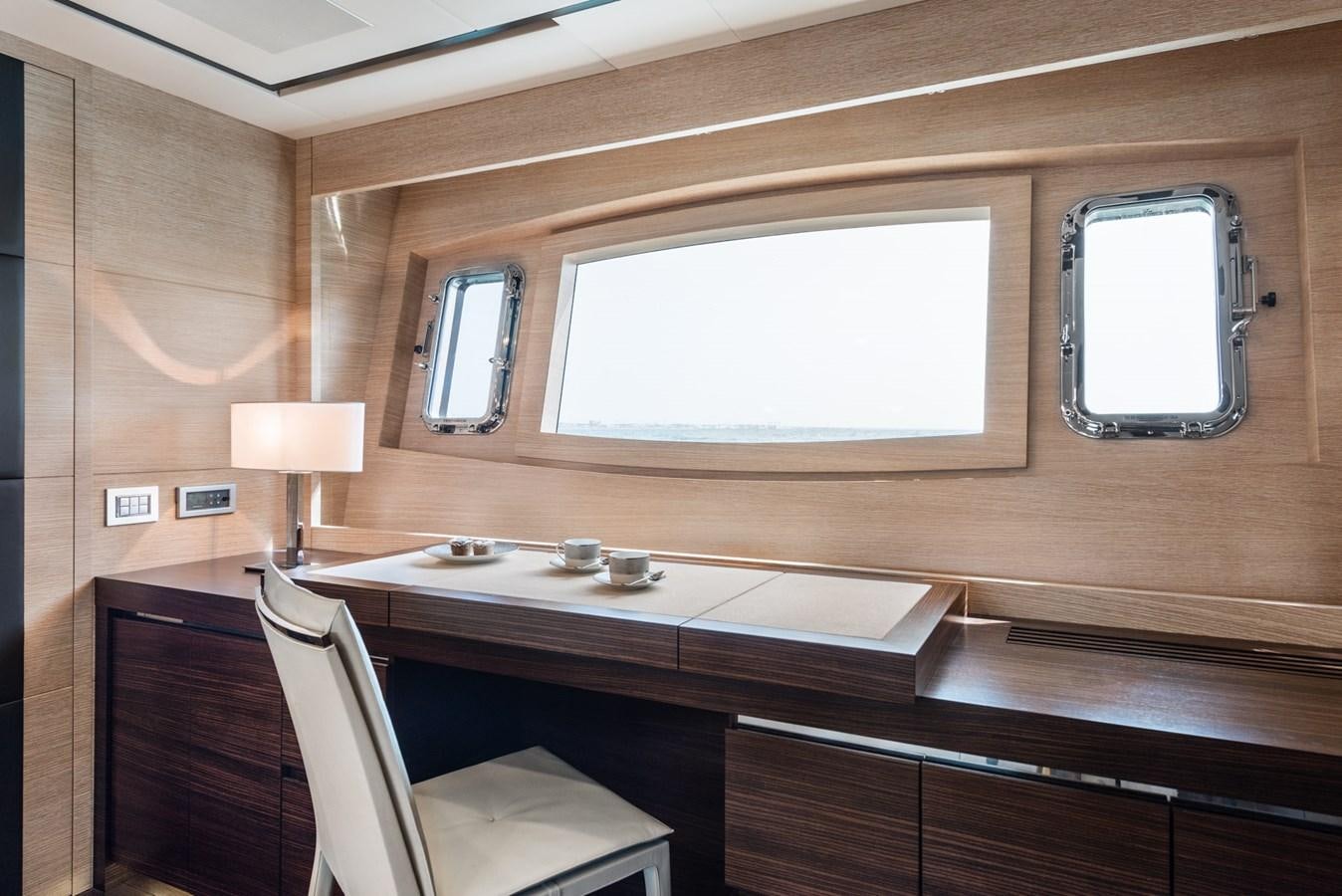 a room with a desk and a window aboard MINE SET Yacht for Sale