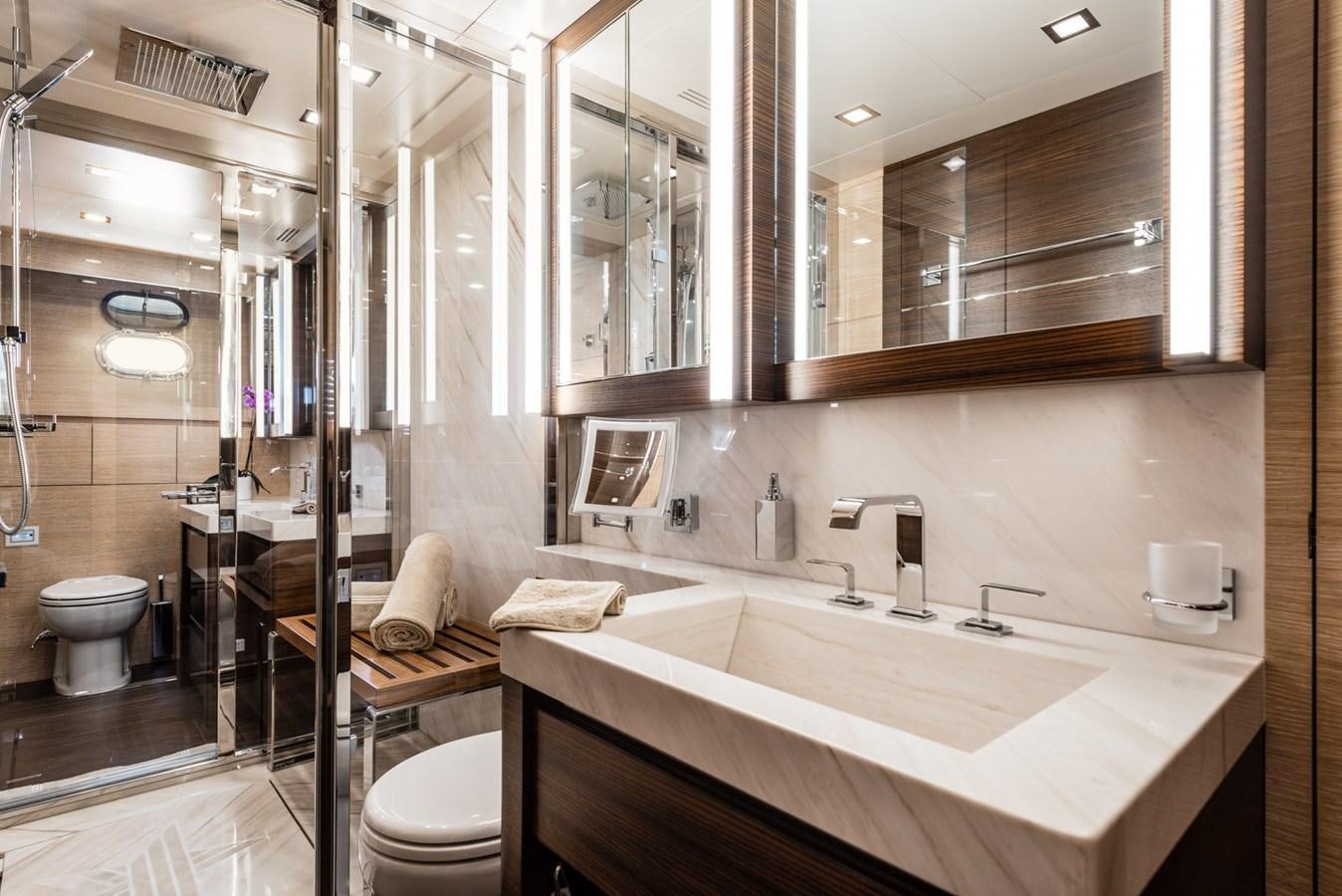 a bathroom with a large mirror aboard MINE SET Yacht for Sale