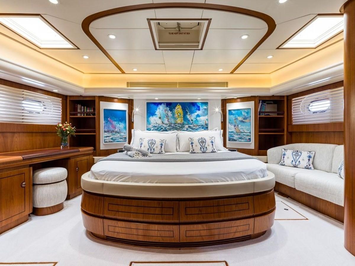 a large bed in a room aboard CHARLATAN Yacht for Sale