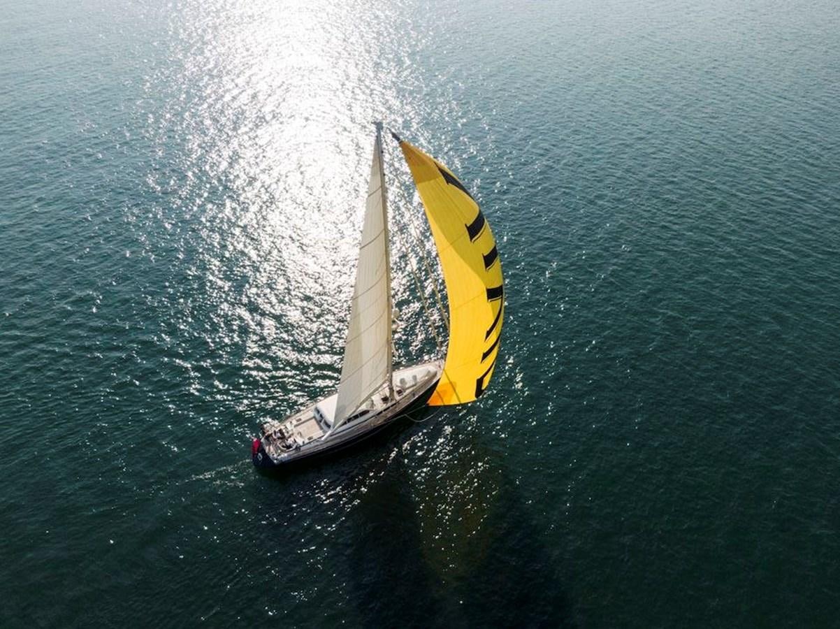 a couple of boats on the water aboard CHARLATAN Yacht for Sale