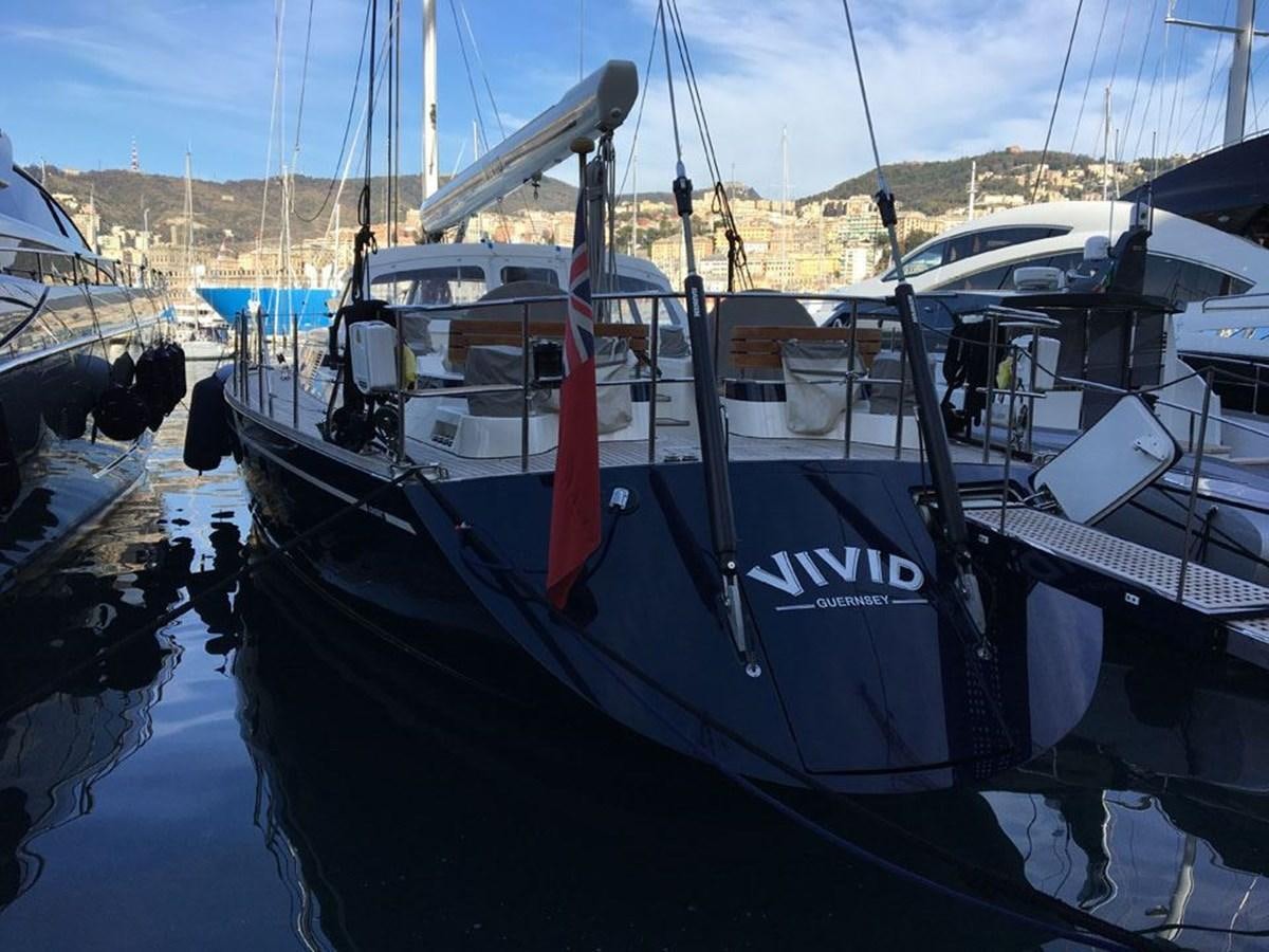 a boat docked in a harbor aboard CHARLATAN Yacht for Sale