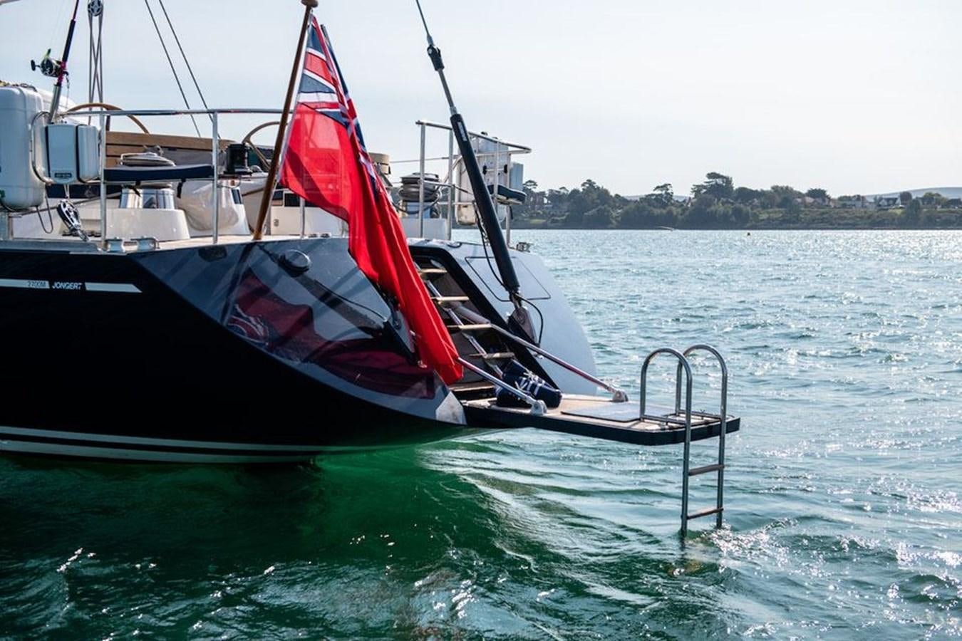 a boat on the water aboard CHARLATAN Yacht for Sale