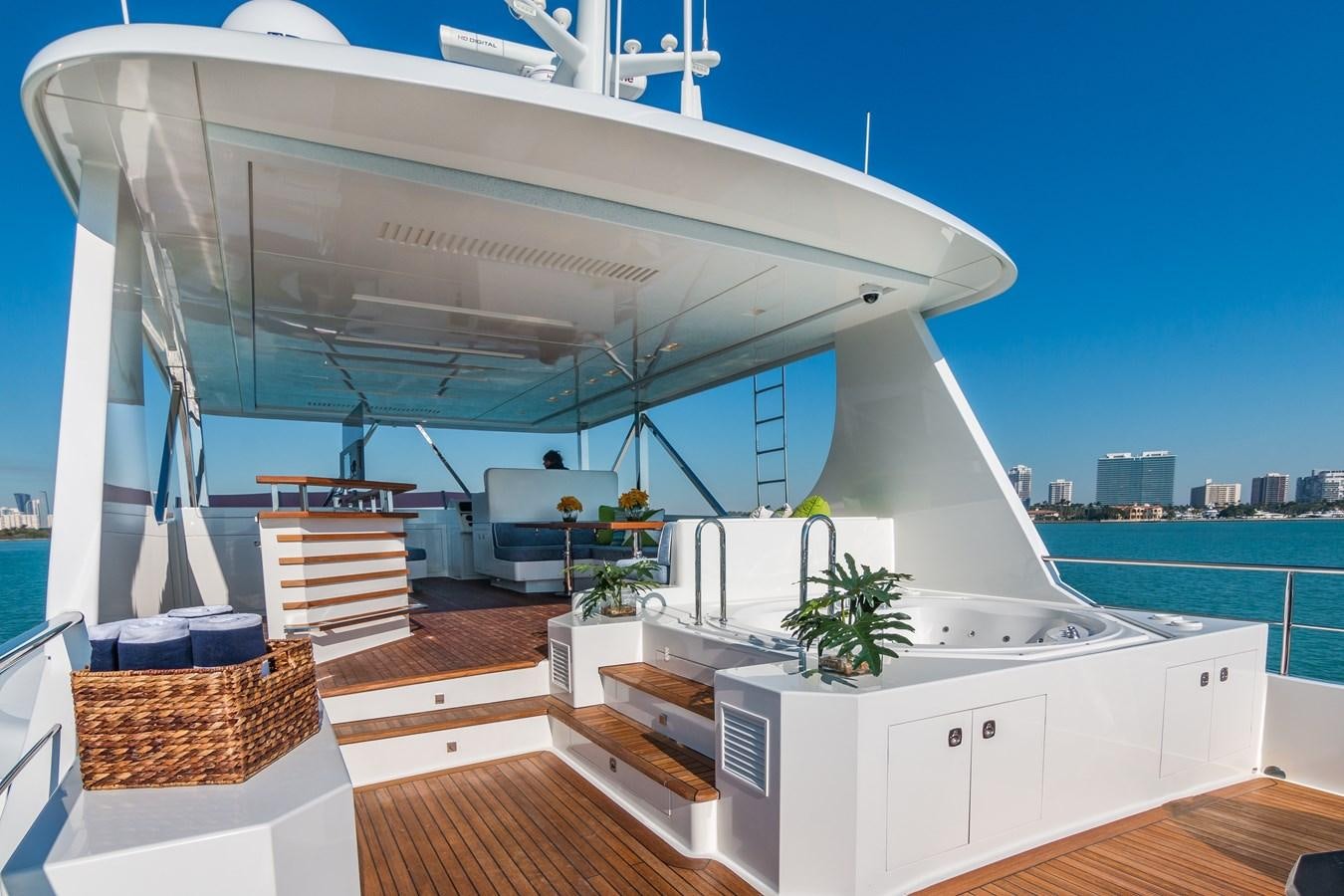 a large white building with a balcony aboard PRIMA MEA Yacht for Sale