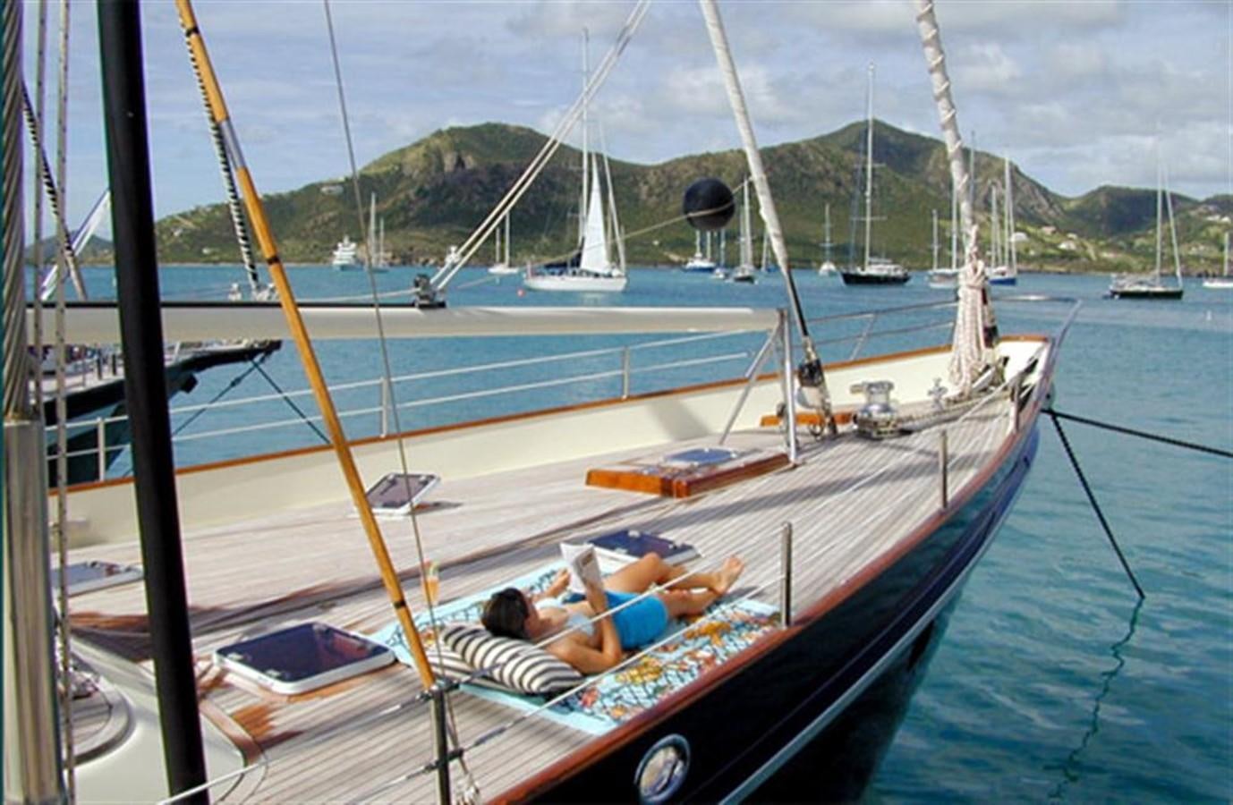a man and woman on a boat aboard AURASTEL Yacht for Sale
