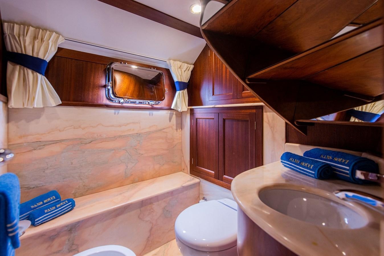 a bathroom with a sink and a toilet aboard SANS SOUCI Yacht for Sale