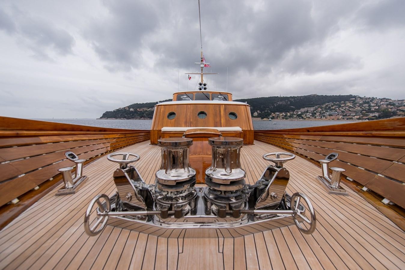 a large ship on a dock aboard SANS SOUCI Yacht for Sale