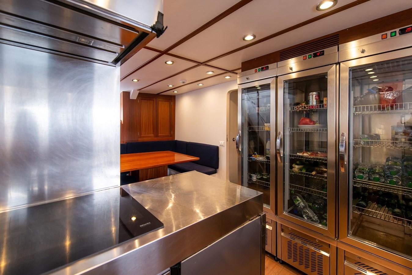 a large kitchen with glass doors aboard SANS SOUCI Yacht for Sale