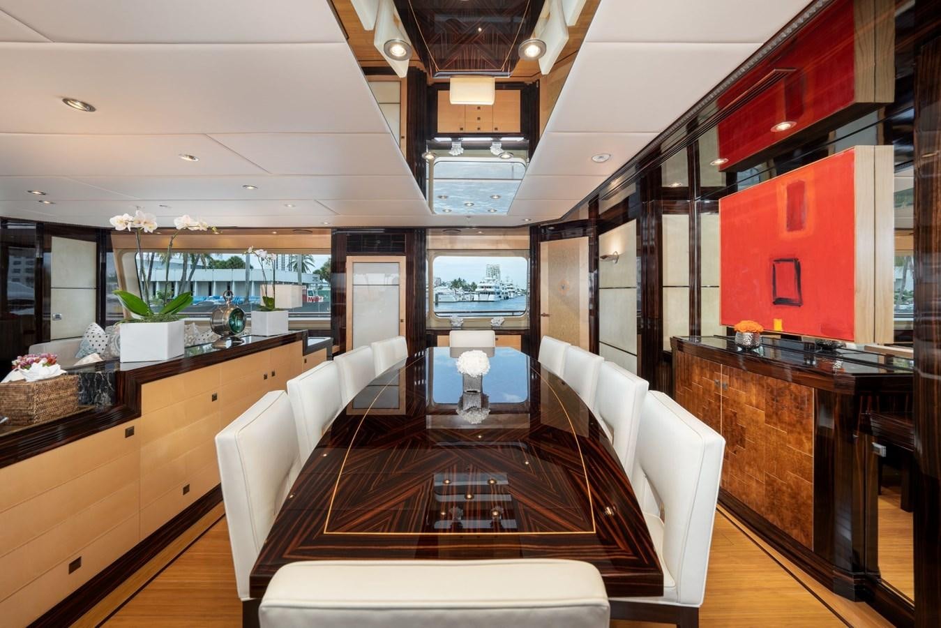 a living room with a wood floor aboard VESPER Yacht for Sale