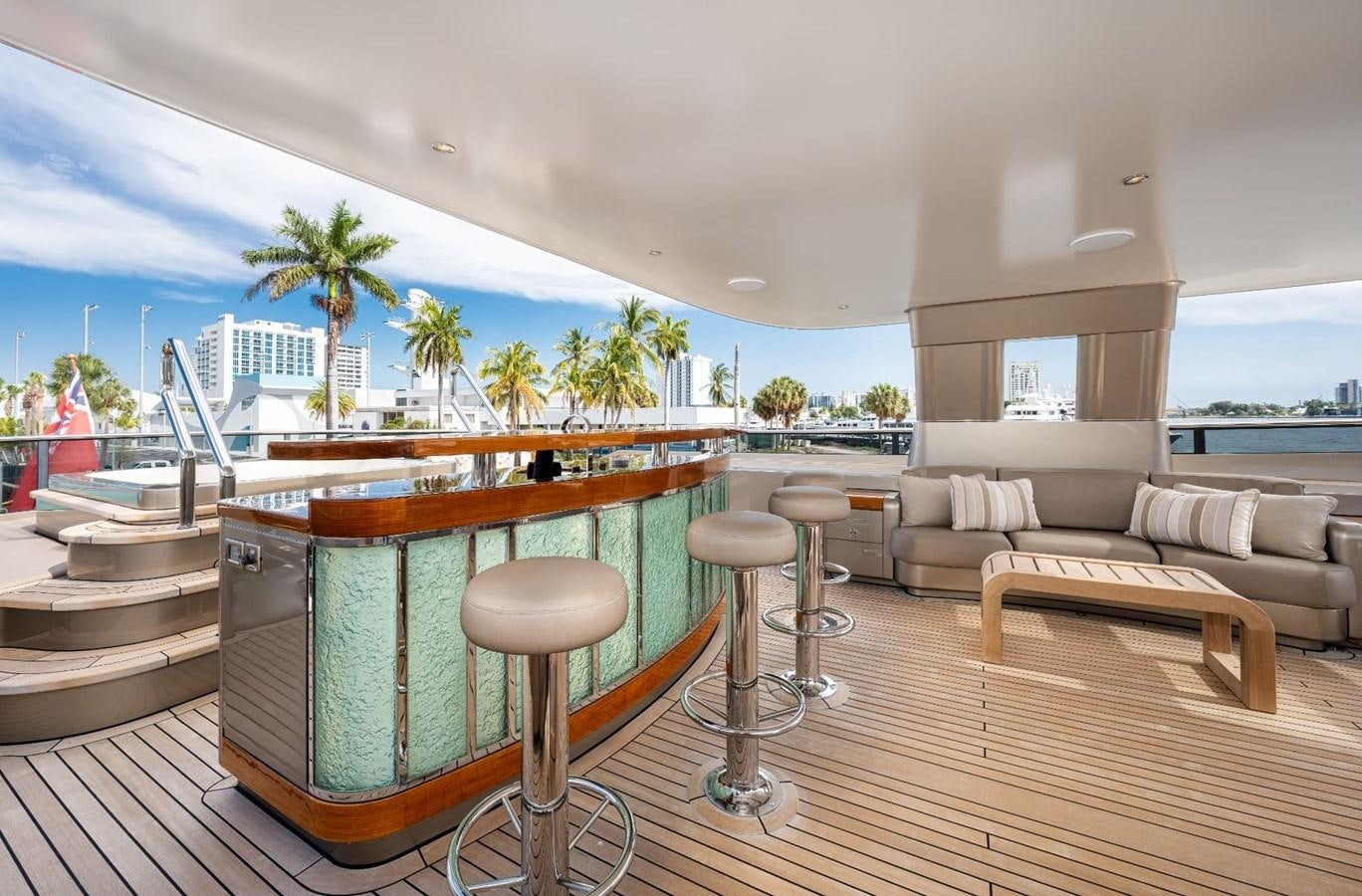 a room with a table and chairs aboard VESPER Yacht for Sale