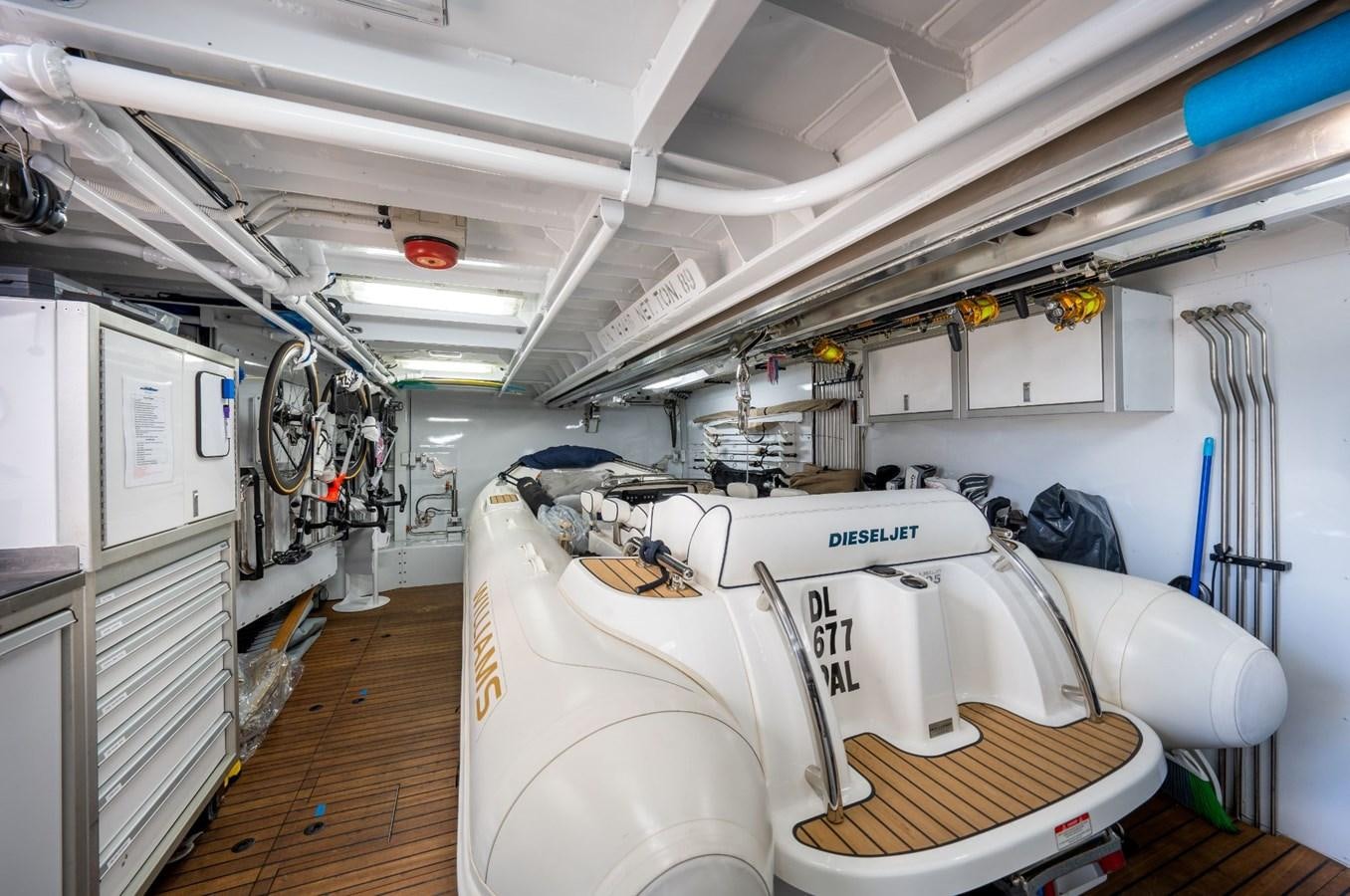 a room with a white couch and white walls and a white couch aboard VESPER Yacht for Sale