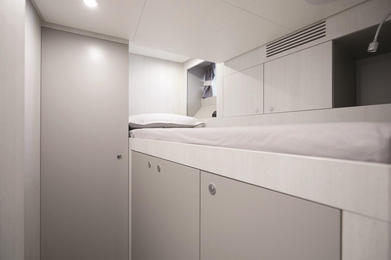 a white bathroom with a white counter aboard AL GASSAR 2022 Yacht for Sale