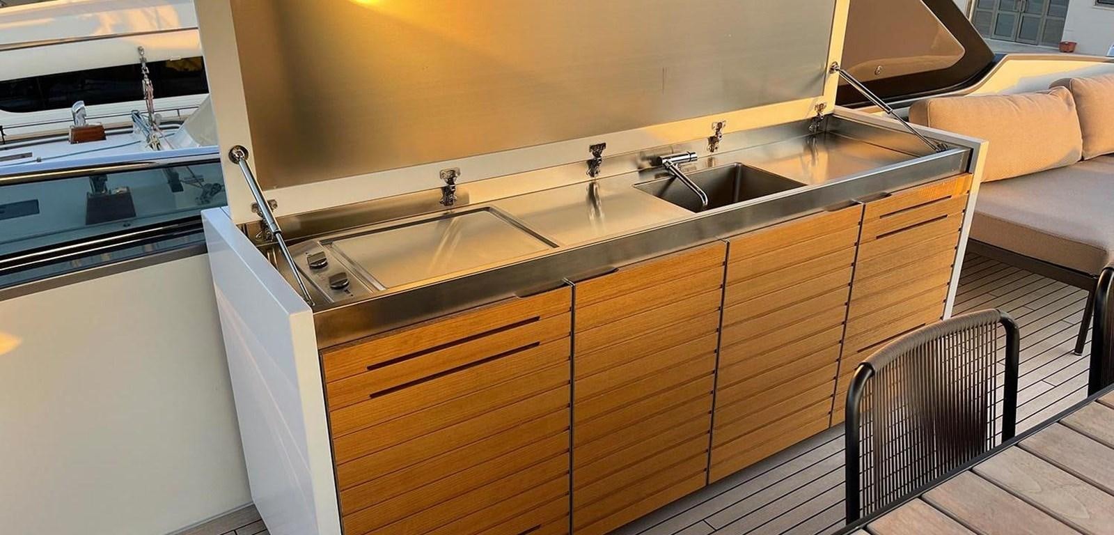 a kitchen with a sink aboard Y2 Yacht for Sale