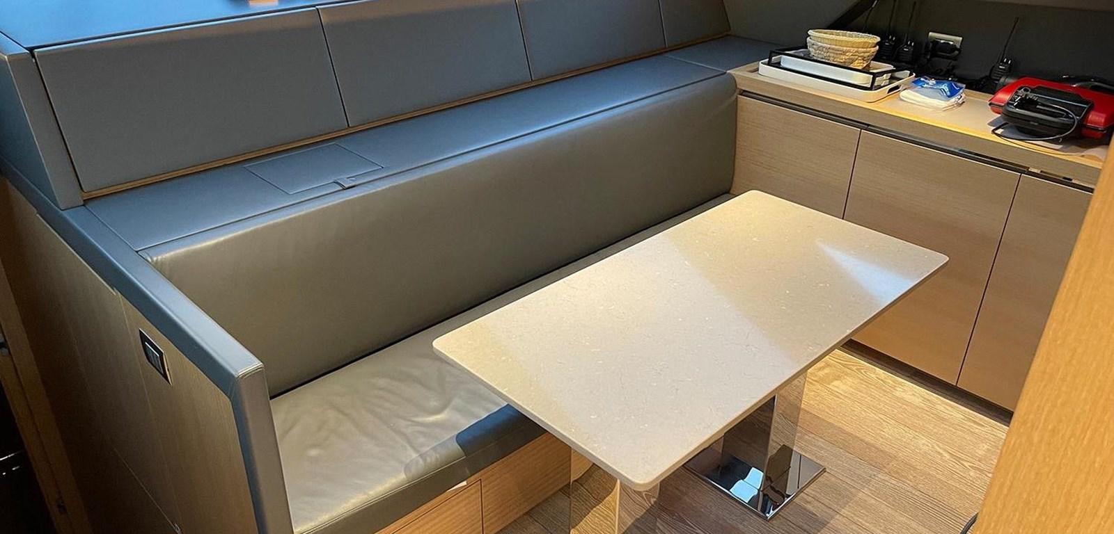 a room with a bed and a desk aboard Y2 Yacht for Sale