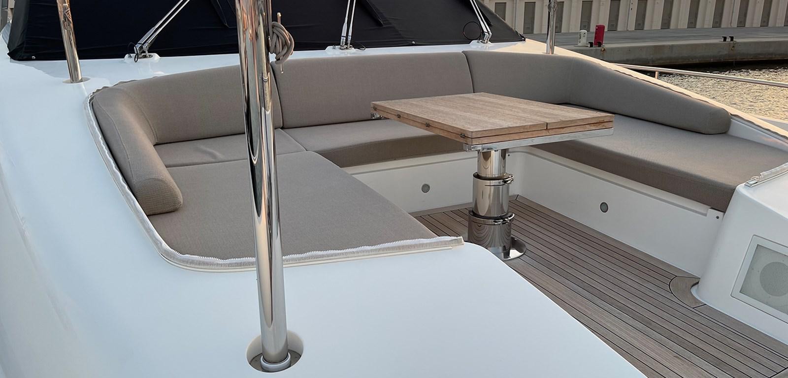 a wooden boat on a boat aboard Y2 Yacht for Sale