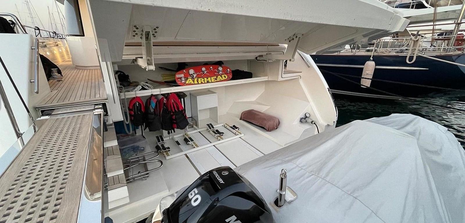 a boat with a seat and a steering wheel aboard Y2 Yacht for Sale