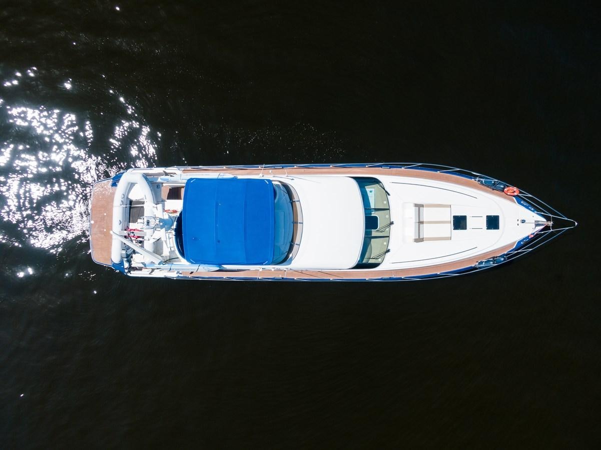 a blue and white boat in the water aboard ANGEL DEL MAR Yacht for Sale