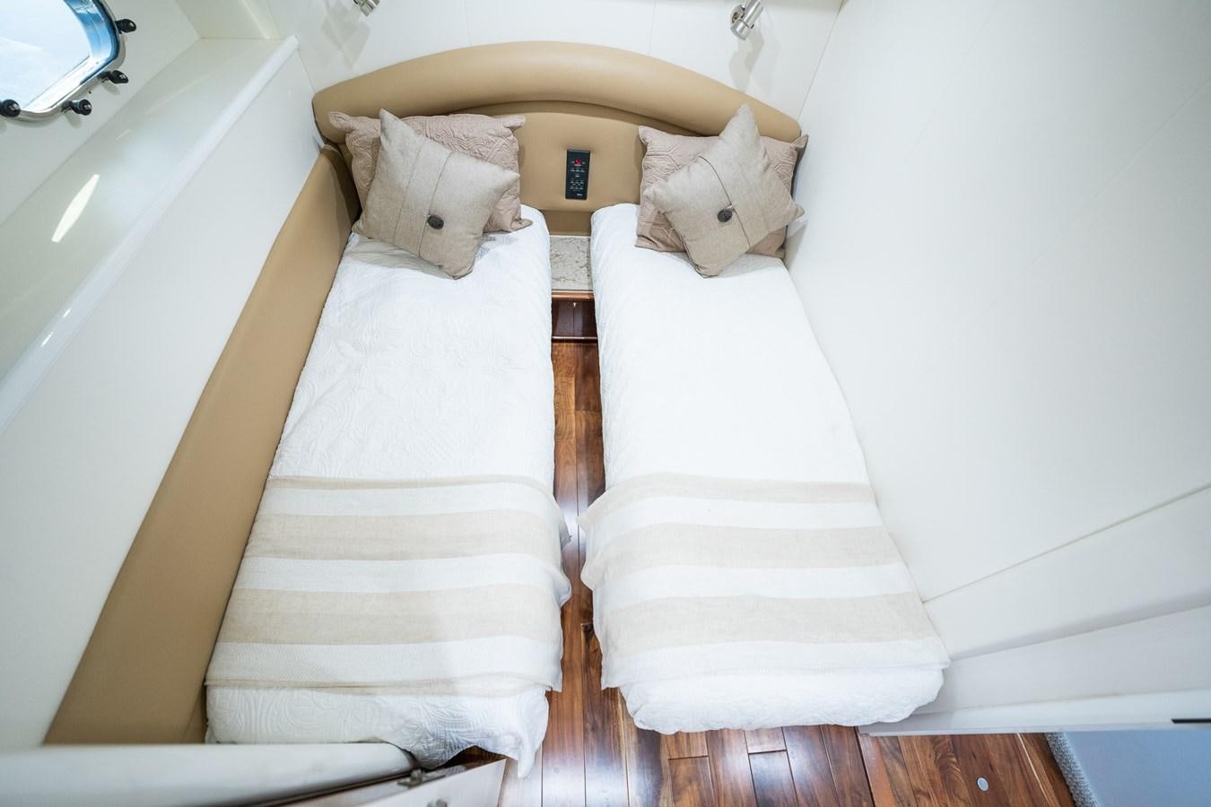a couple of beds in a room aboard ANGEL DEL MAR Yacht for Sale